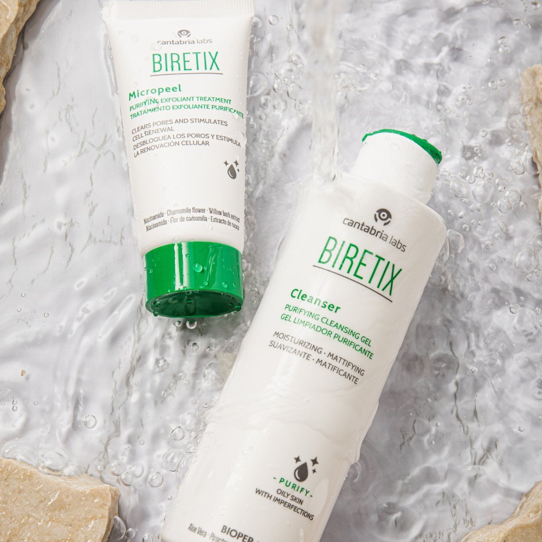 biretix cleanser with green lettering on a bottle